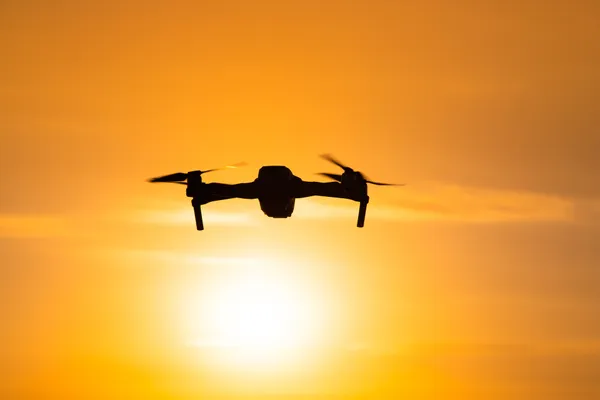 Drone Gliding in Sunset